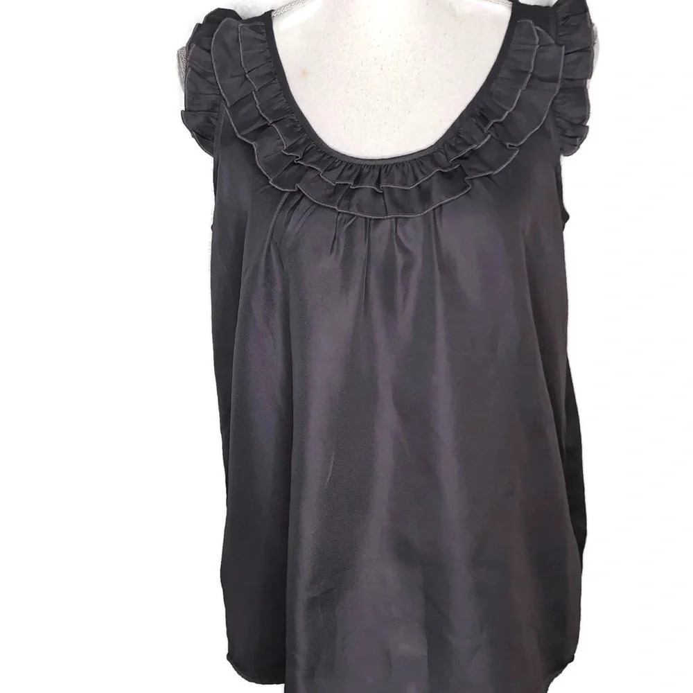 Tommy Hilfiger woman’s sleeveless top.  Size Med